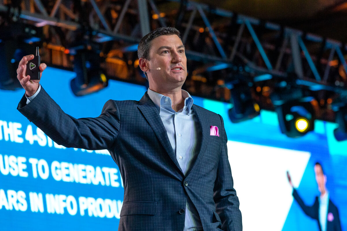 Russ Henneberry speaking on stage